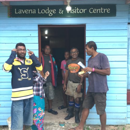 Donating reading glasses in Lavena Island Spirit Fiji