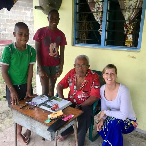 Donating reading glasses in Lavena Island Spirit Fiji